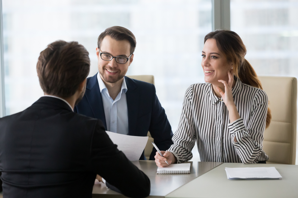 happy employers listen to applicant at interview excited of candidature